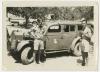 Lester Collins and Arthur Howe, Jr. by an AFS staff car in Tunisia. Recto