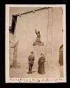 A. Piatt Andrew and a priest in front of the church where Joan of Arc had her first communion...
