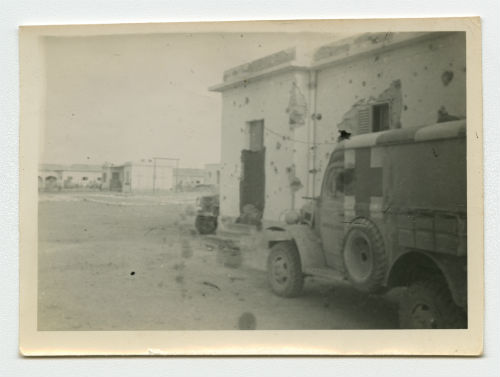 Tobruk Hospital with an AFS ambulance, Libya. Recto