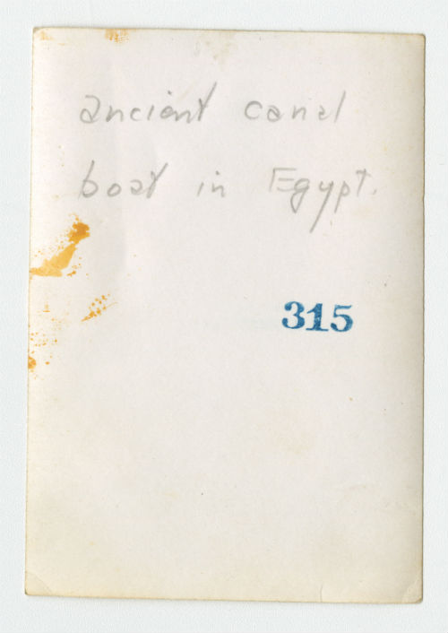 Ancient canal boat in Egypt. Verso