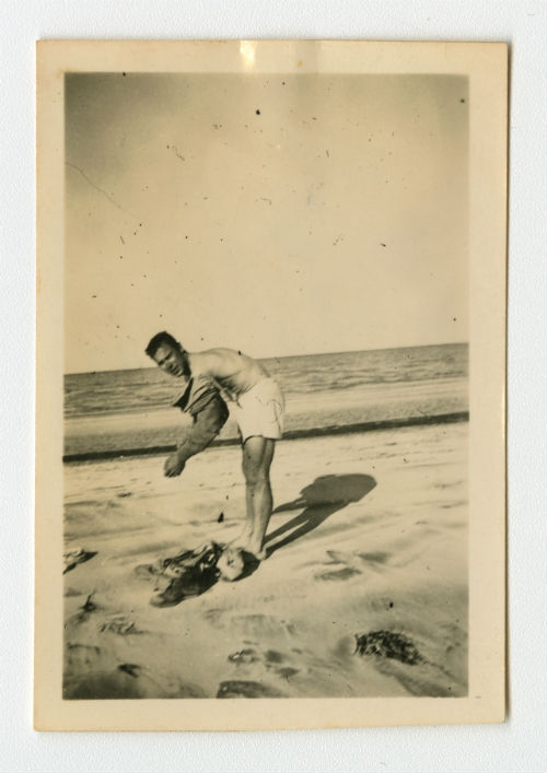 Arthur Howe, Jr. on a beach. Recto