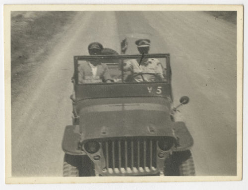 Charles Beach Powell and Edwin "Pat" Fiero following Arthur Howe Jr.'s car in convoy. Recto