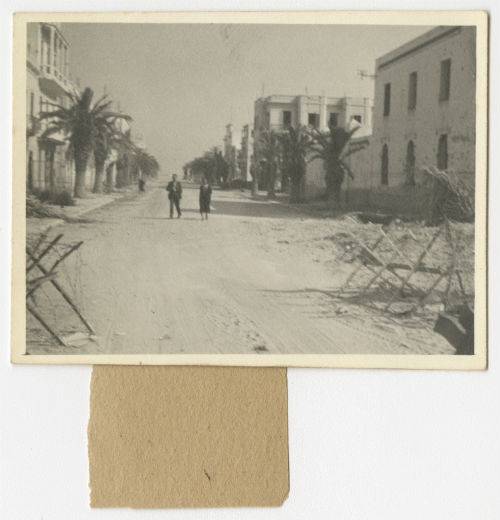 A desolate street in Sousse, Tunisia after a recent bombing. Recto