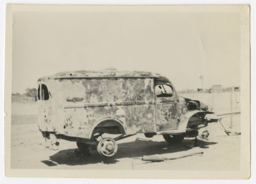 Ambulance destroyed by a mine in the Western Desert. Recto
