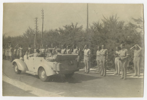AFS volunteers are reviewed by King George VI and General Montgomery in Tripoli. Recto