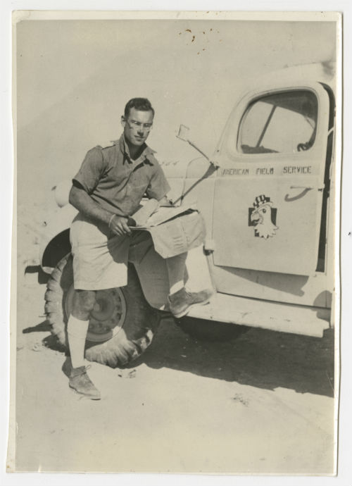 Arthur Howe, Jr. beside an AFS ambulance with the 567 Coy insignia. Recto